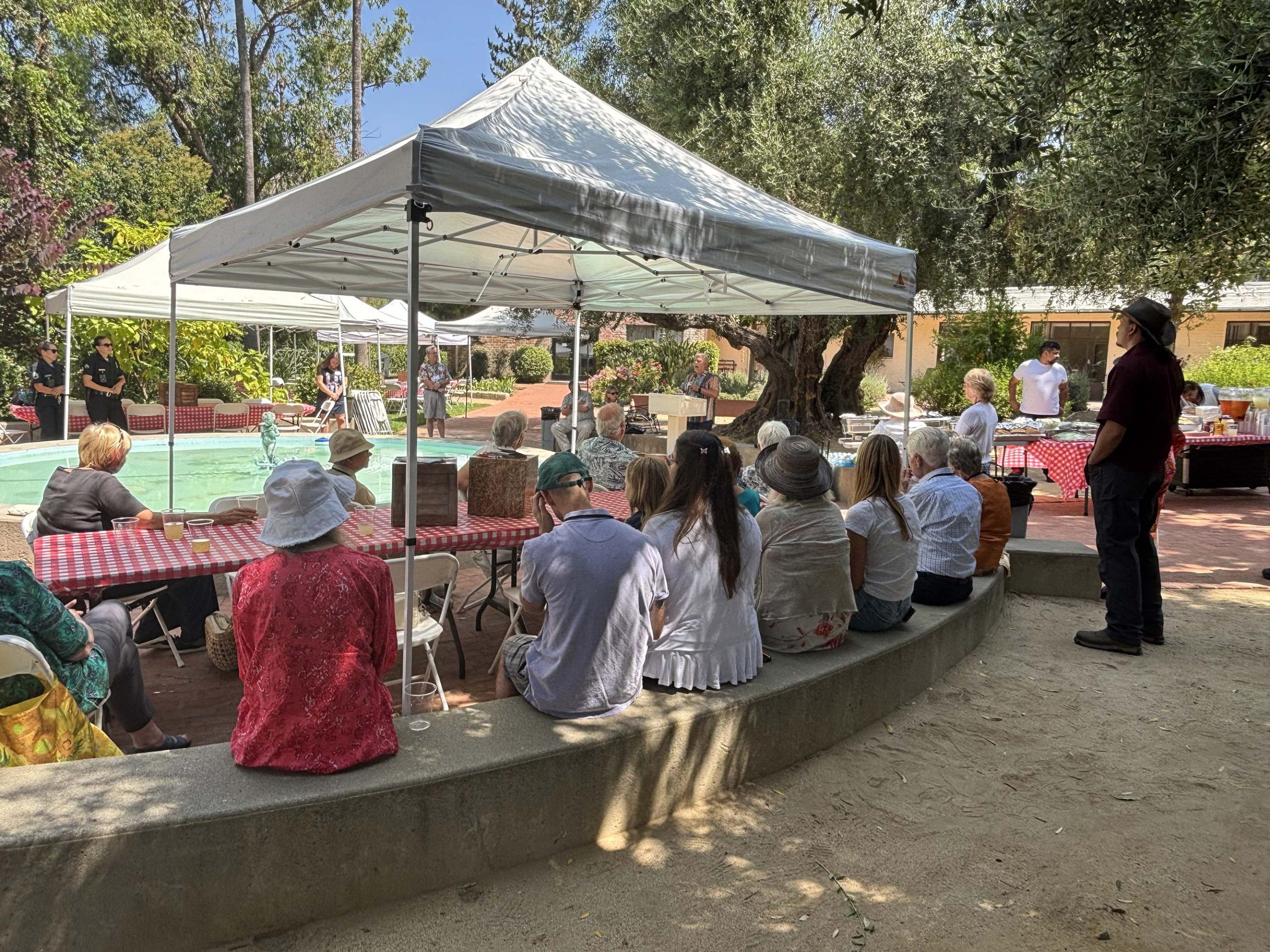 Friends of several generations gathering outdoors at Broadview
