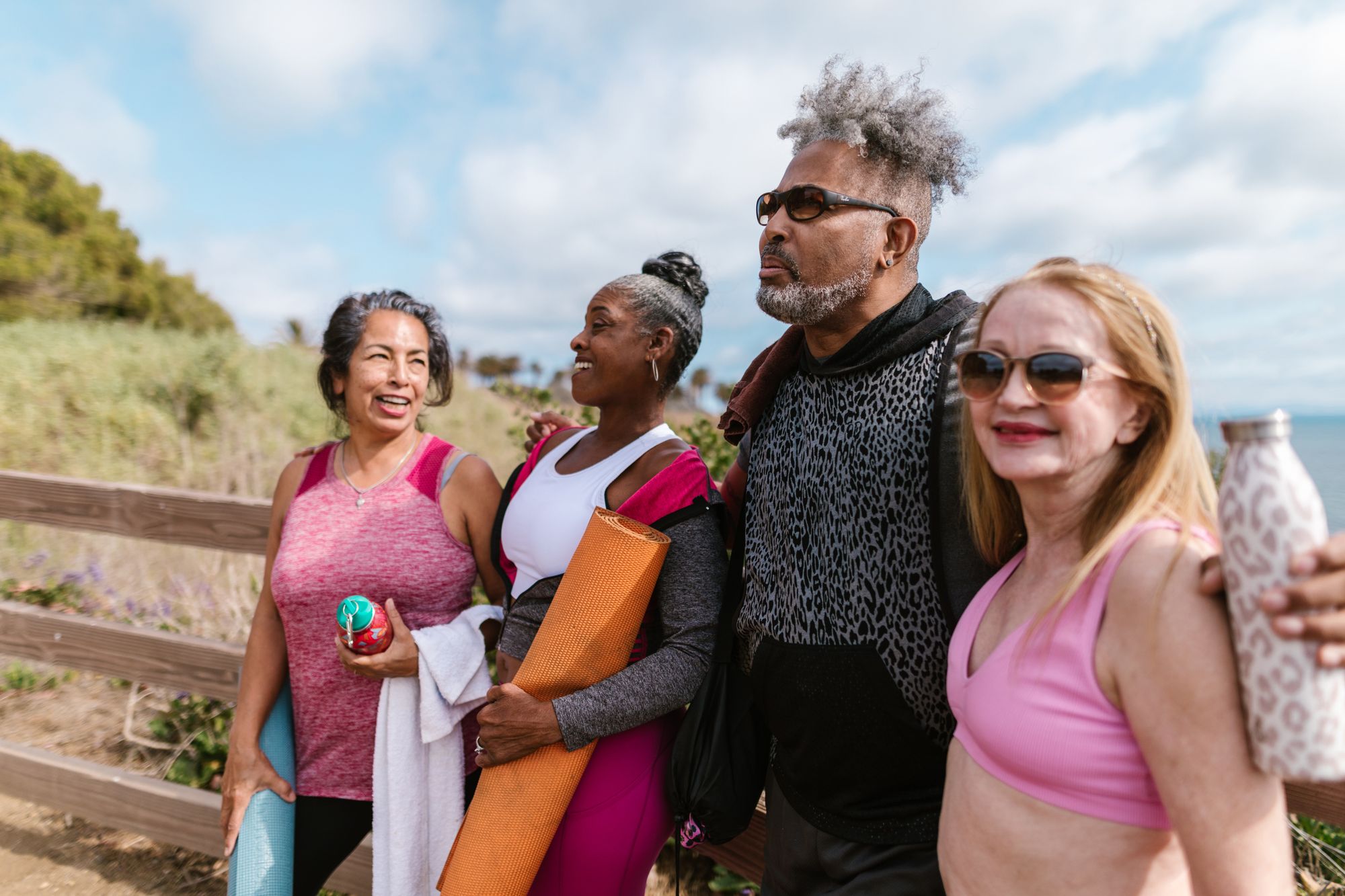 Adults gathering after an outdoor wellness class