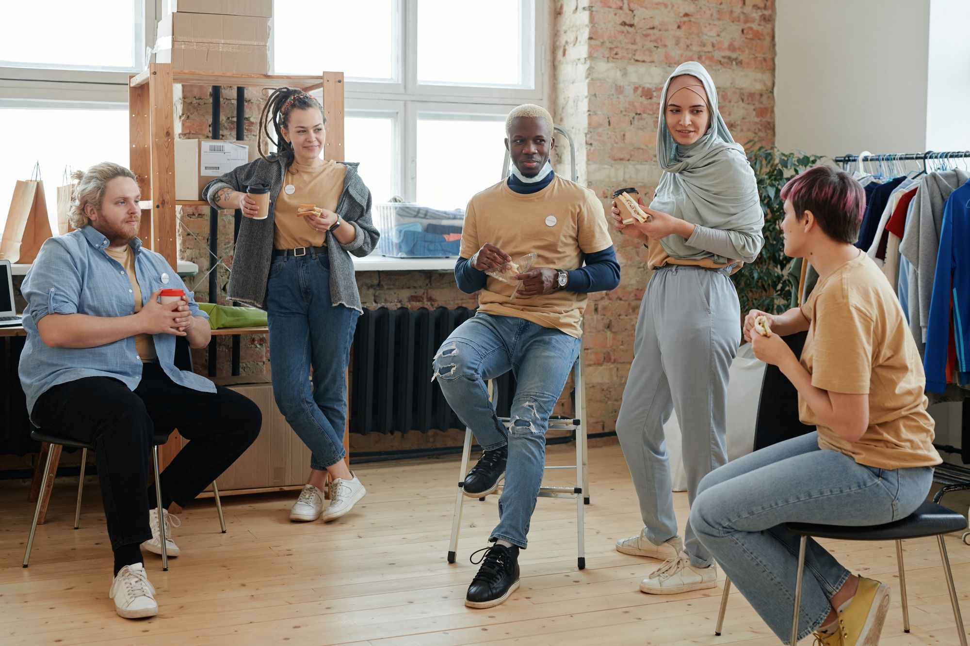 Young adult volunteers connecting during a community project